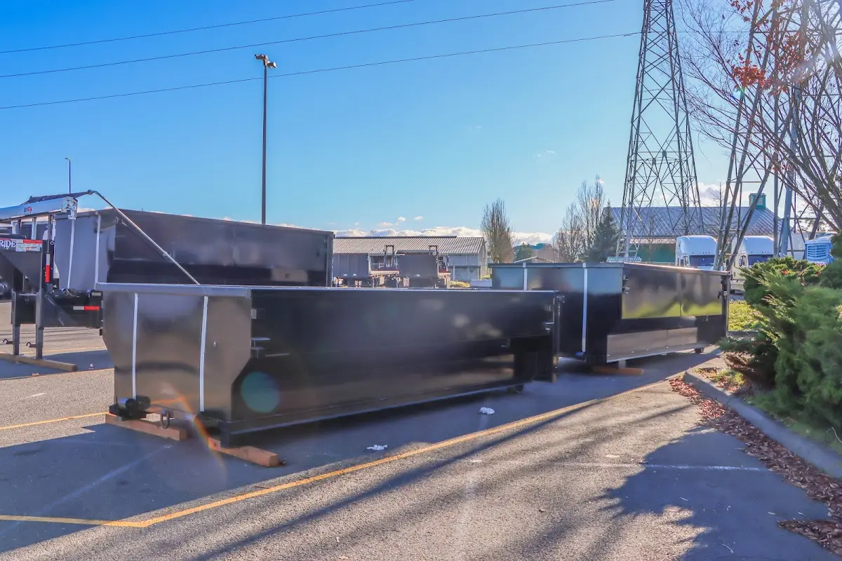 Roll-off dumpster ready for waste disposal at job site for 15 Yard Dumpster Rental in Plainville